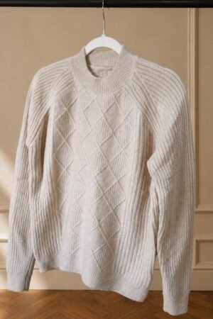 SWEATER CON BRILLO