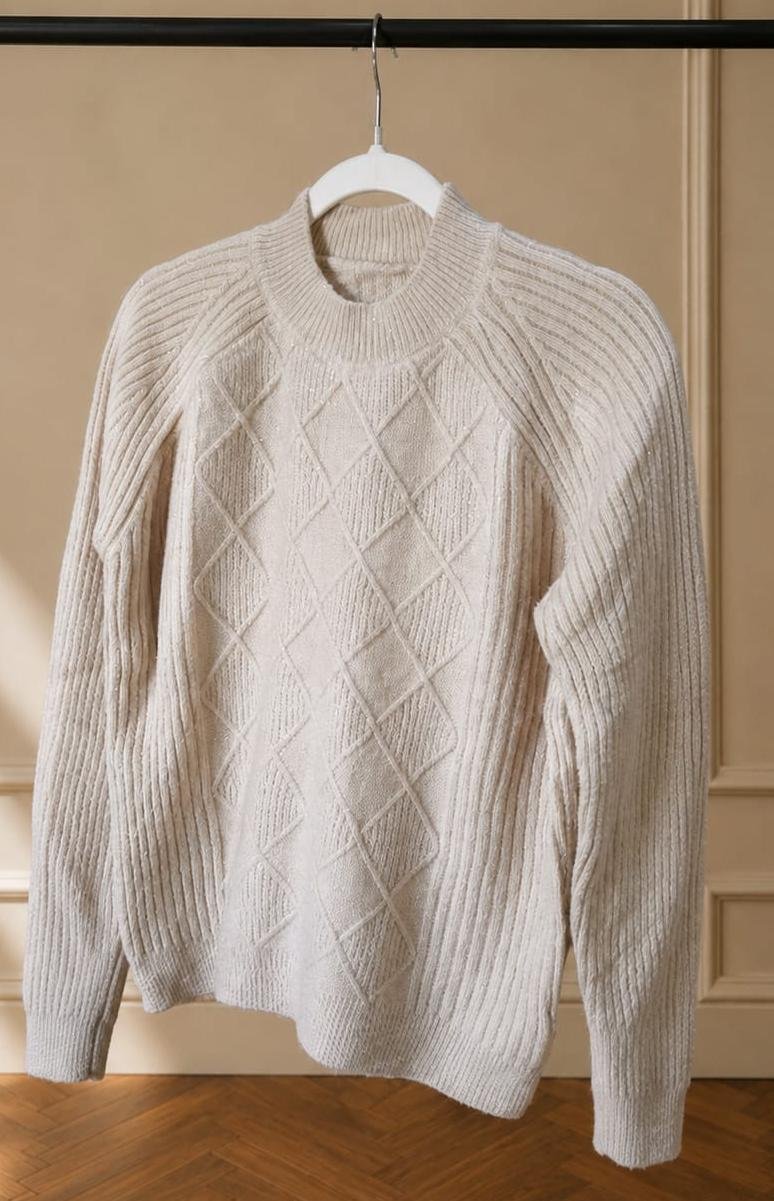 SWEATER CON BRILLO